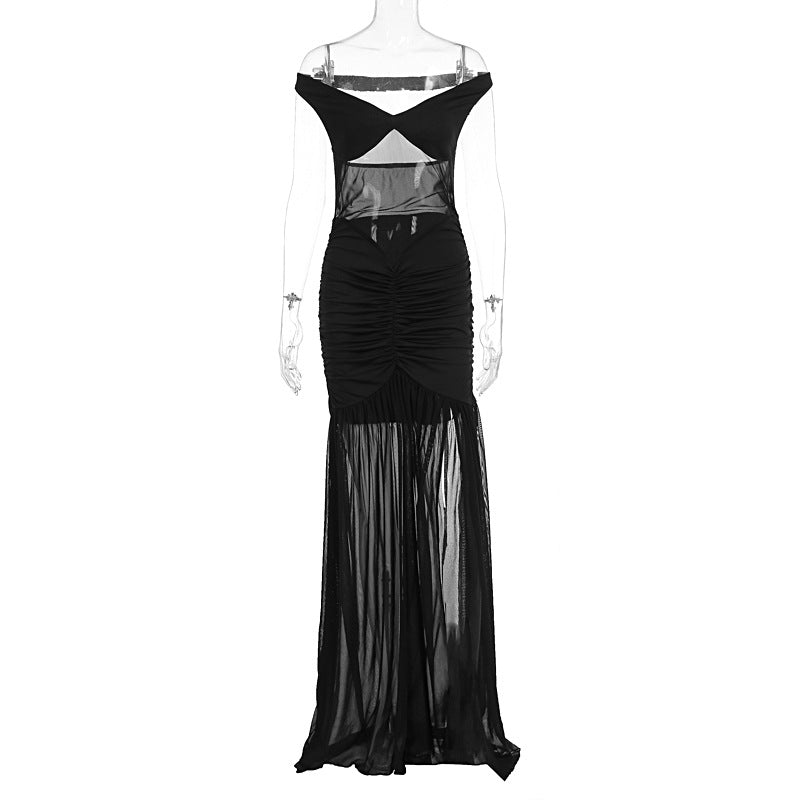 Dams elegant maxiklänning med transparenta inslag och figursydd design Mirla-Eva Jonsson