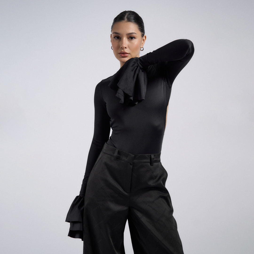 Dams figursmickrande body med eleganta volangdetaljer Mirla-Eva Jonsson