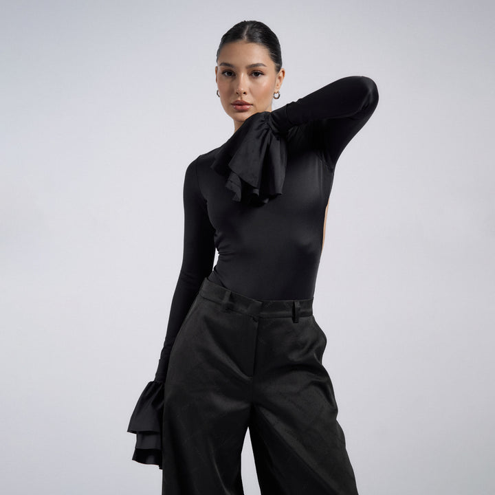 Dams figursmickrande body med eleganta volangdetaljer Mirla-Eva Jonsson