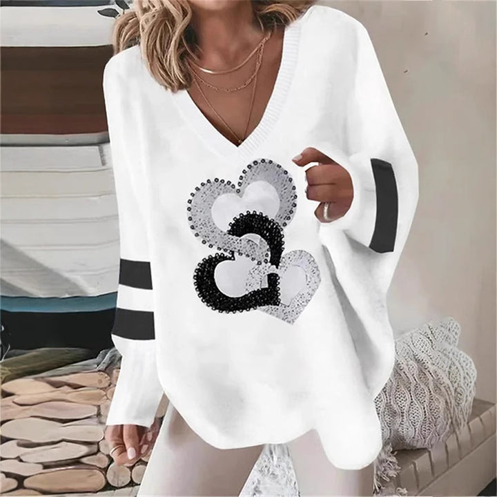 Dams hoodie med hjärtmotiv och eleganta kontraststräck Mirla-Eva Jonsson