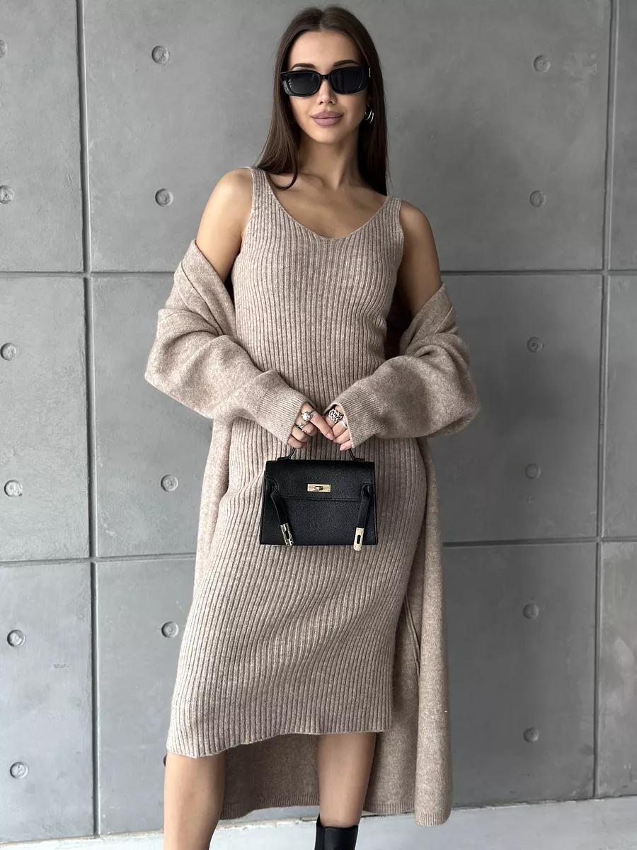 Dams knit dress with deep V-neck and long cut Eva Jonsson-Eva Jonsson
