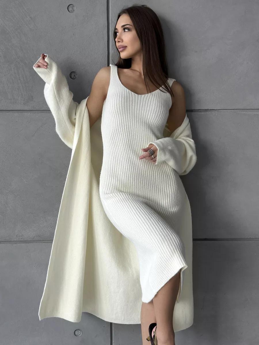 Dams knit dress with deep V-neck and long cut Eva Jonsson-Eva Jonsson
