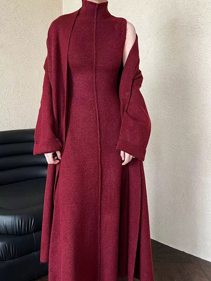 Dams lång stickad kappa med hög krage och elegant skärning Eva Jonsson-Eva Jonsson