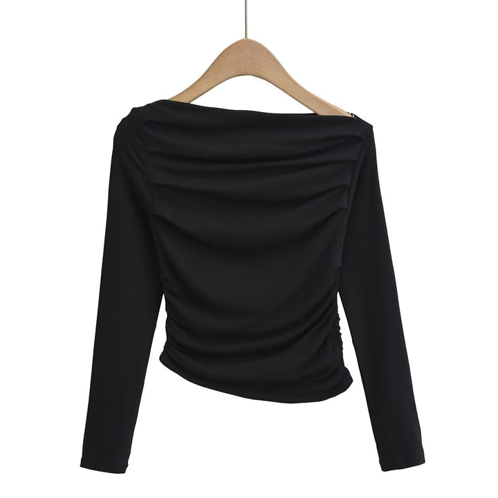 Dams långärmad topp med rynkat design och asymmetrisk halsringning Mirla-Eva Jonsson