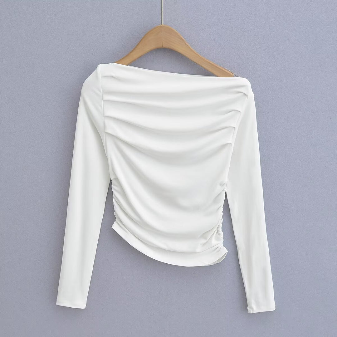 Dams långärmad topp med rynkat design och asymmetrisk halsringning Mirla-Eva Jonsson