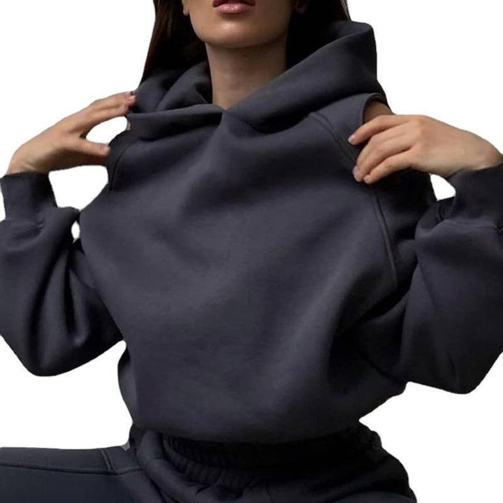 Dams stiliga hoodie topp med öppna axlar och lös passform Mirla-Eva Jonsson