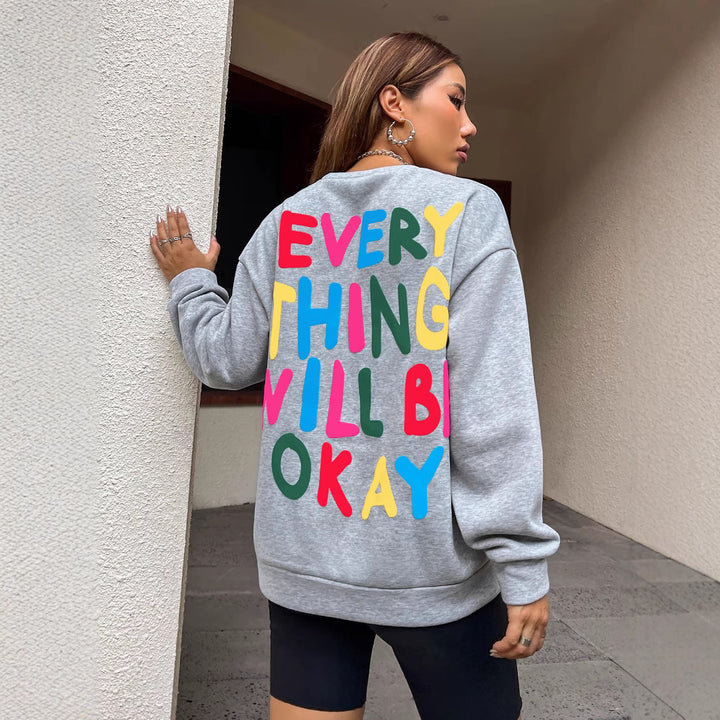 Dams sweatshirt med färgglad text Mirla-Eva Jonsson