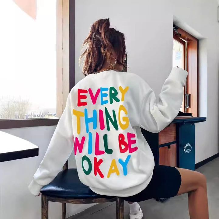 Dams sweatshirt med färgglad text Mirla-Eva Jonsson