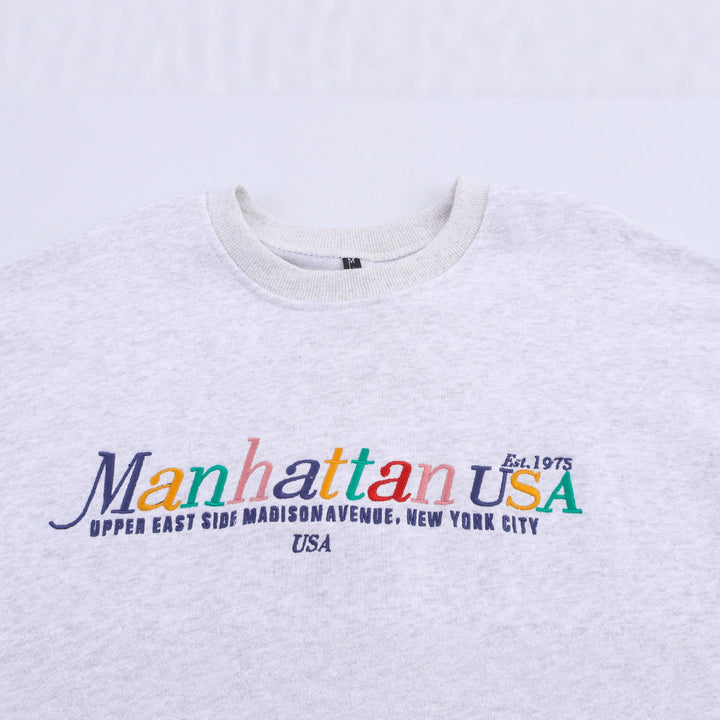 Dams sweatshirt med iögonfallande text Mirla-Eva Jonsson