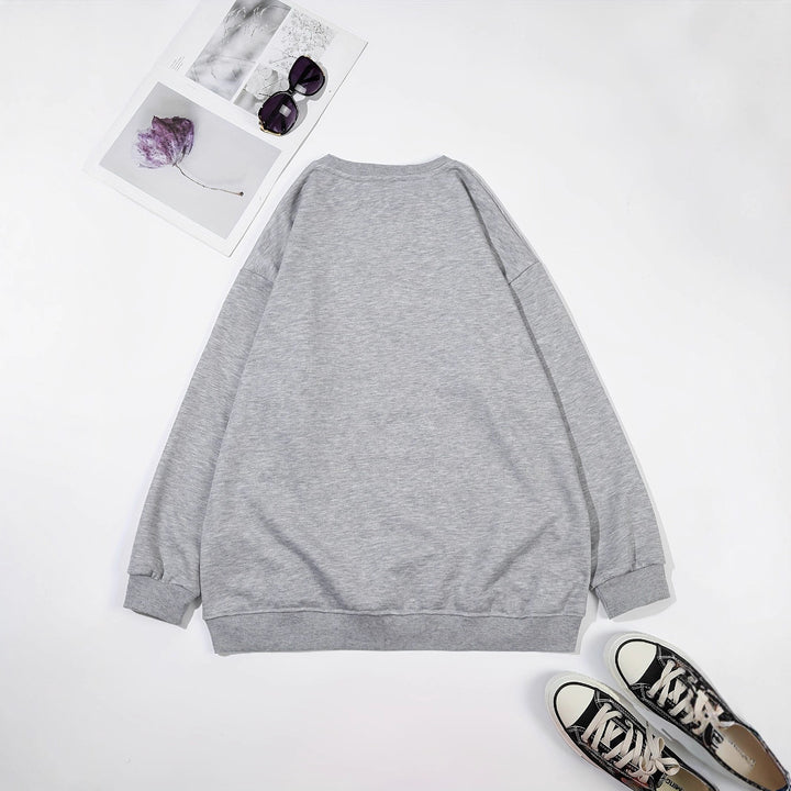 Dams sweatshirt med kreativ botanisk tryck Mirla-Eva Jonsson