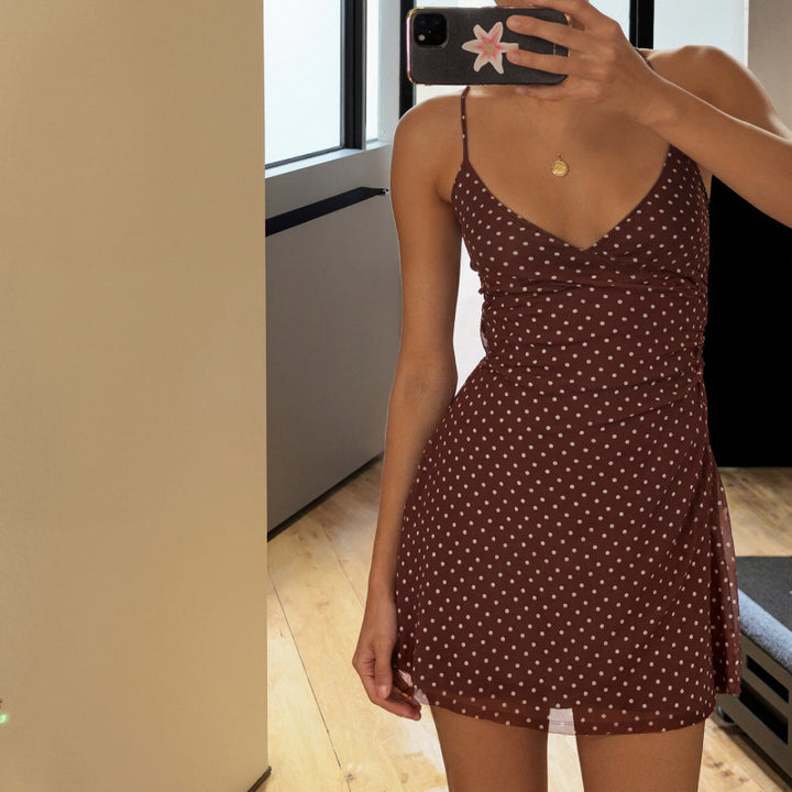Dams sweet spaghetti strap dress with polka dot pattern and flowing cut Mirla-Eva Jonsson