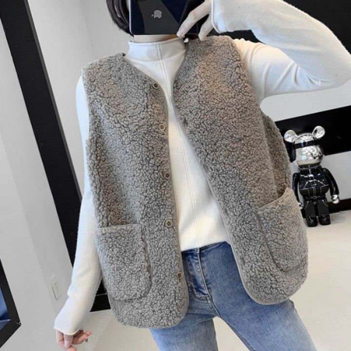 Dams teddy fleece väst med praktiska fickor och knäppning Mirla-Eva Jonsson