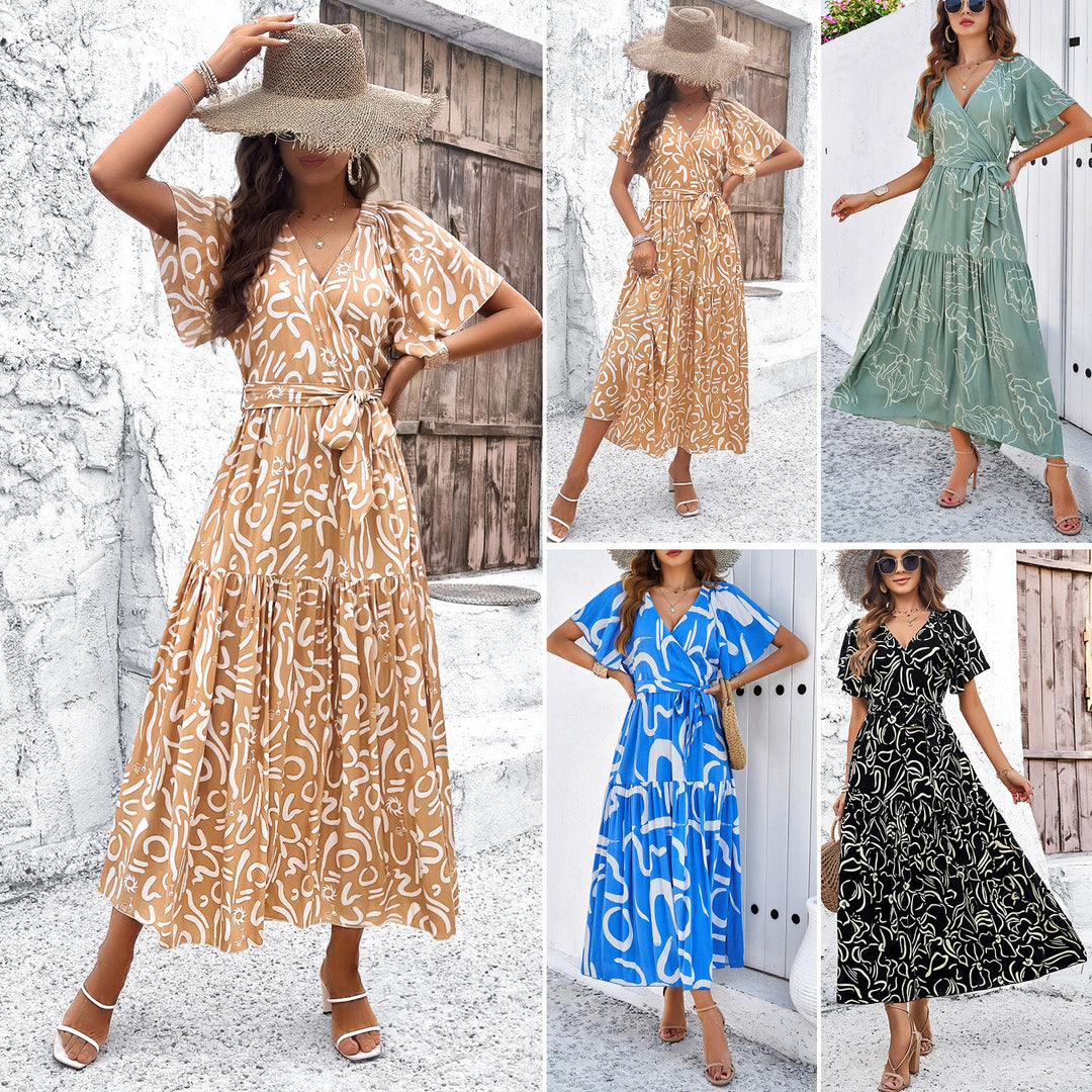 Dams wrap dress with voluminous sleeves and playful pattern Mirla-Eva Jonsson