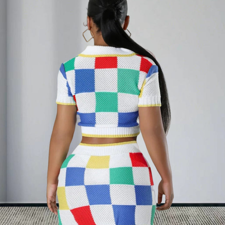 Damsätt från modernt crop-top och figurnära kjol med knappr detaljer Mirla-Eva Jonsson