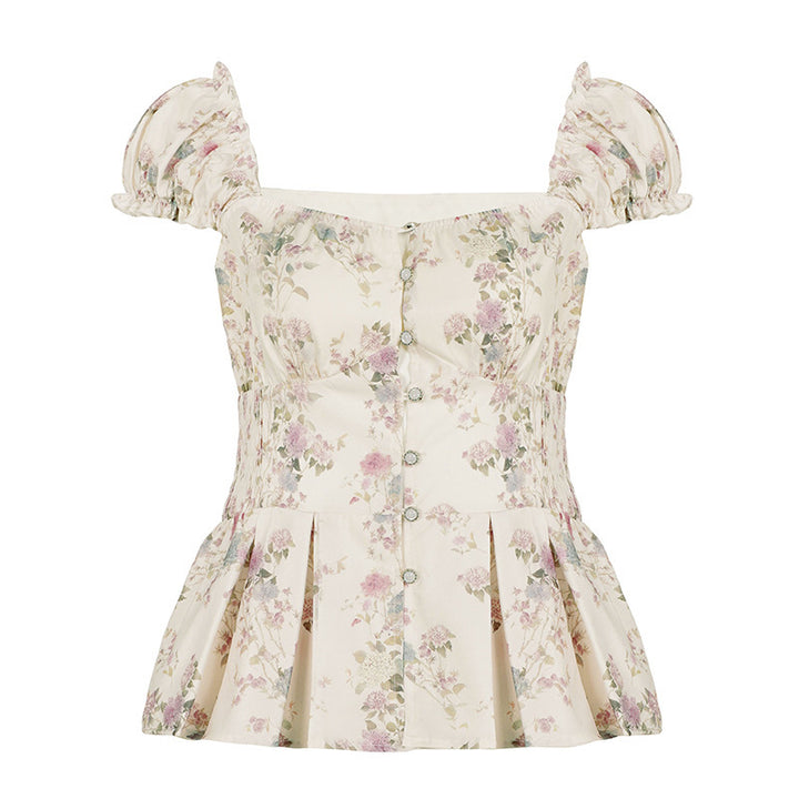 Damsblus med blommönster och volangärmar Mirla-Eva Jonsson