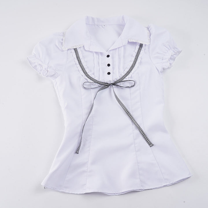 Damsblus med ruffle detaljer och kontrasterande krage Mirla-Eva Jonsson