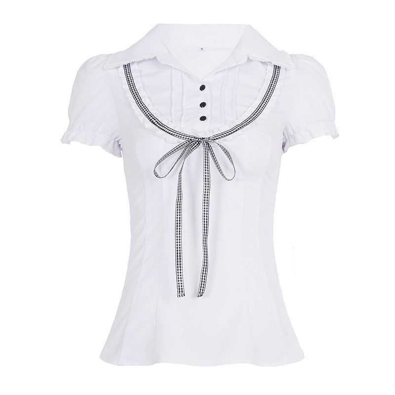 Damsblus med ruffle detaljer och kontrasterande krage Mirla-Eva Jonsson