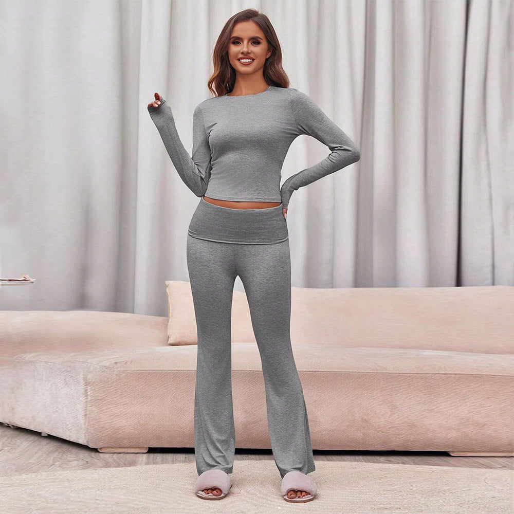 Damset bestående av långärmad topp och figurnära leggings Mirla-Eva Jonsson