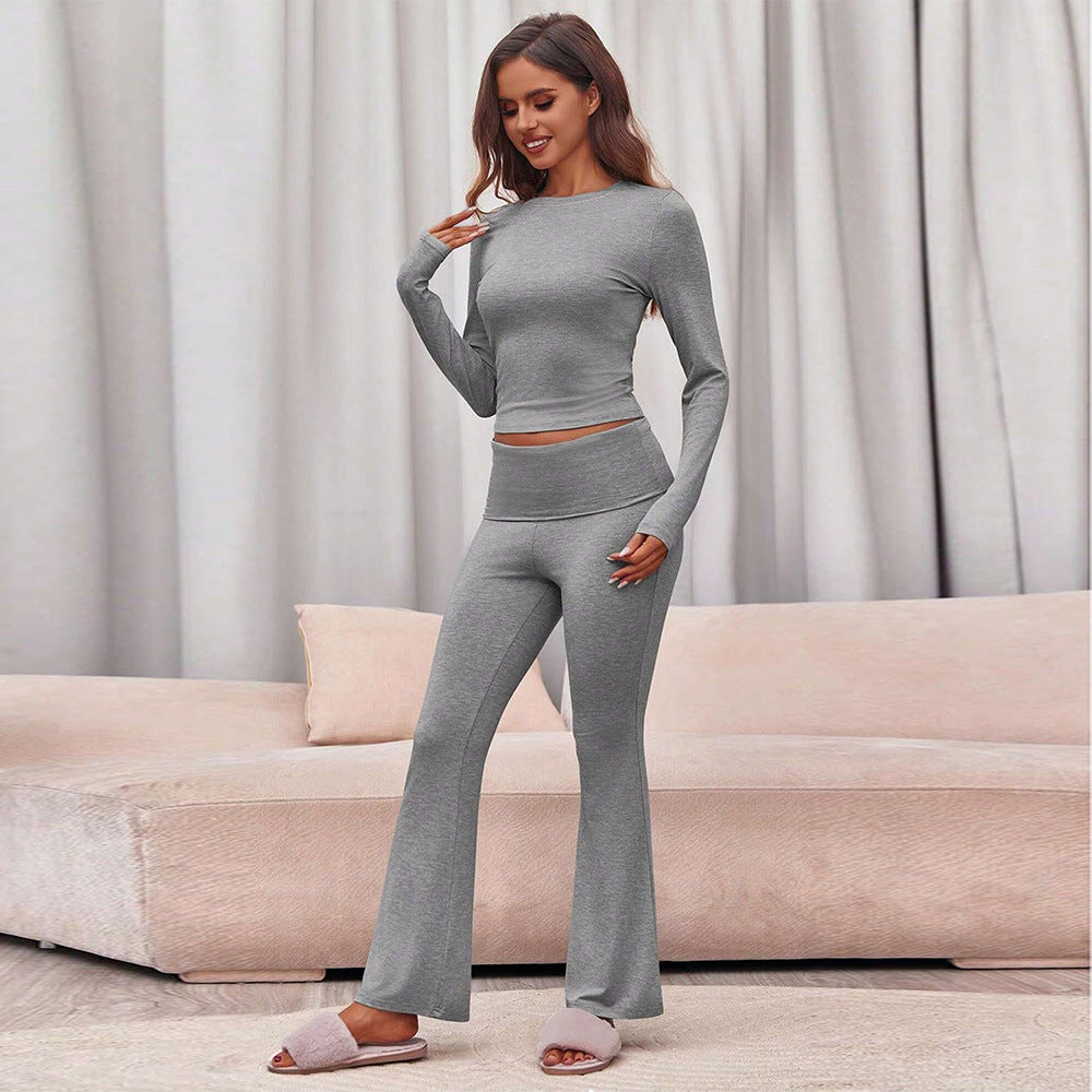 Damset bestående av långärmad topp och figurnära leggings Mirla-Eva Jonsson