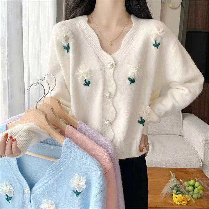 Damsk Cardigan med Blommönster och Eleganta Pärnsknappar Mirla-Eva Jonsson