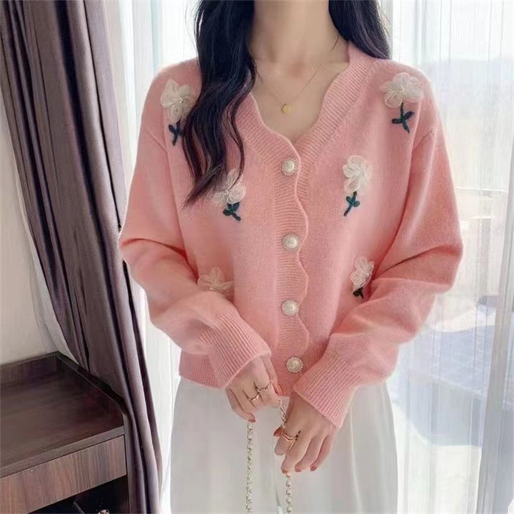 Damsk Cardigan med Blommönster och Eleganta Pärnsknappar Mirla-Eva Jonsson