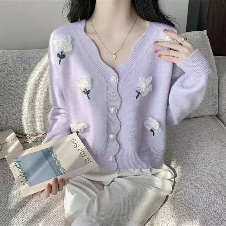 Damsk Cardigan med Blommönster och Eleganta Pärnsknappar Mirla-Eva Jonsson