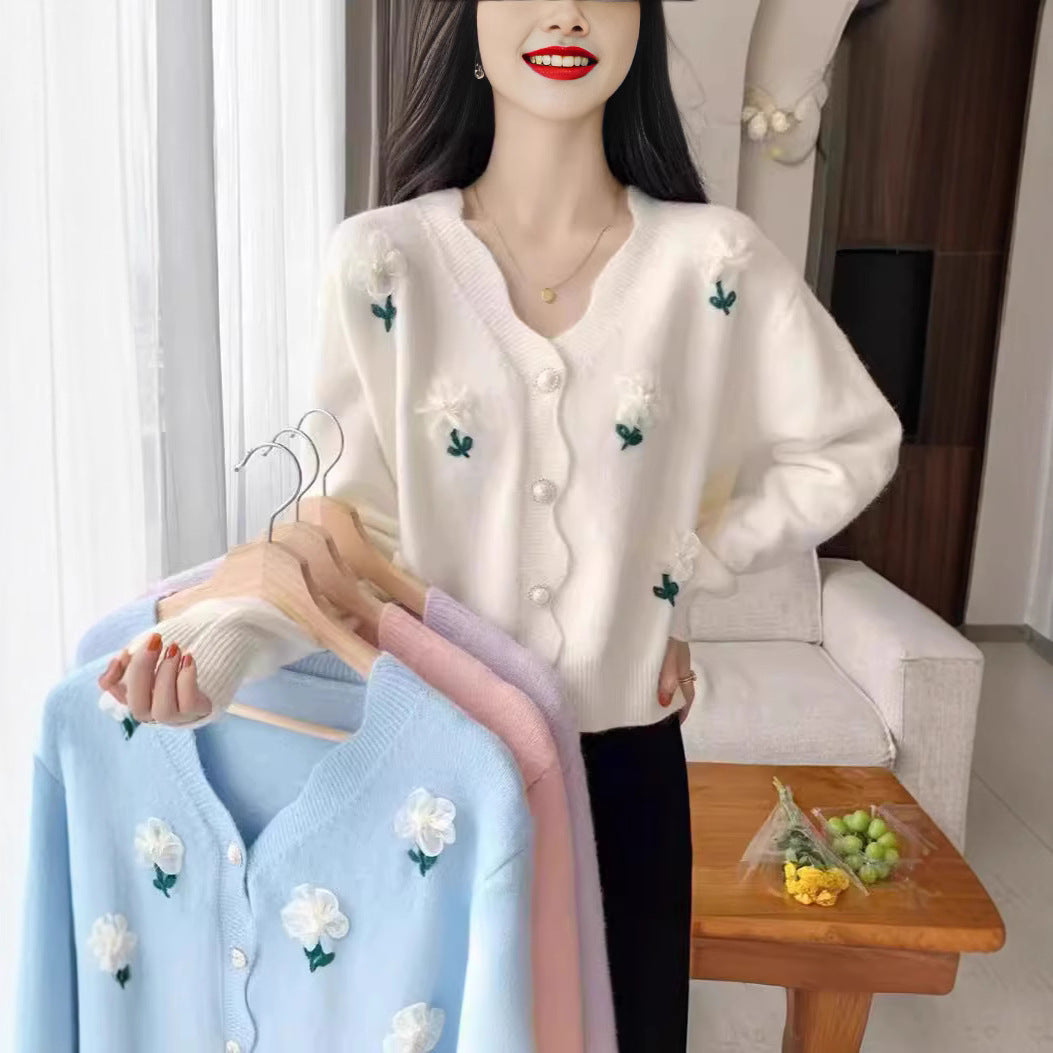 Damsk Cardigan med Blommönster och Eleganta Pärnsknappar Mirla-Eva Jonsson