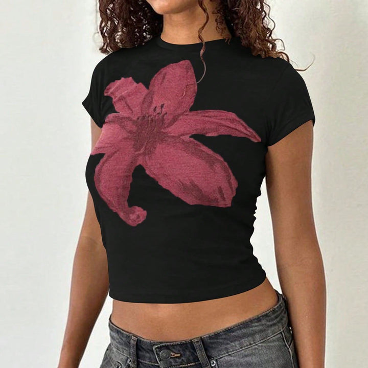Damsk Crop-T-Shirt med blommönster och kroppsnära passform Mirla-Eva Jonsson