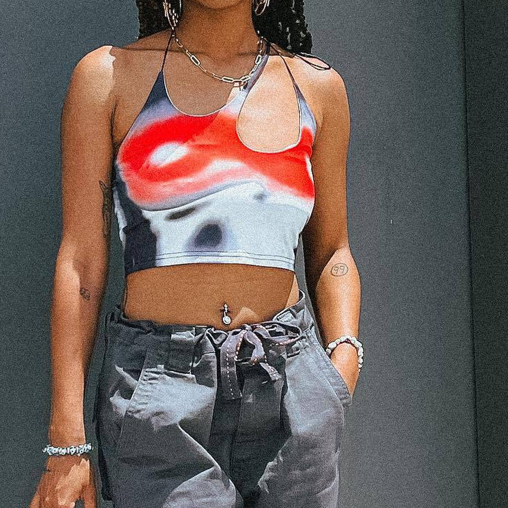 Damsk Crop-top med asymmetrisk axelbanddesign och livlig grafisk tryck Mirla-Eva Jonsson