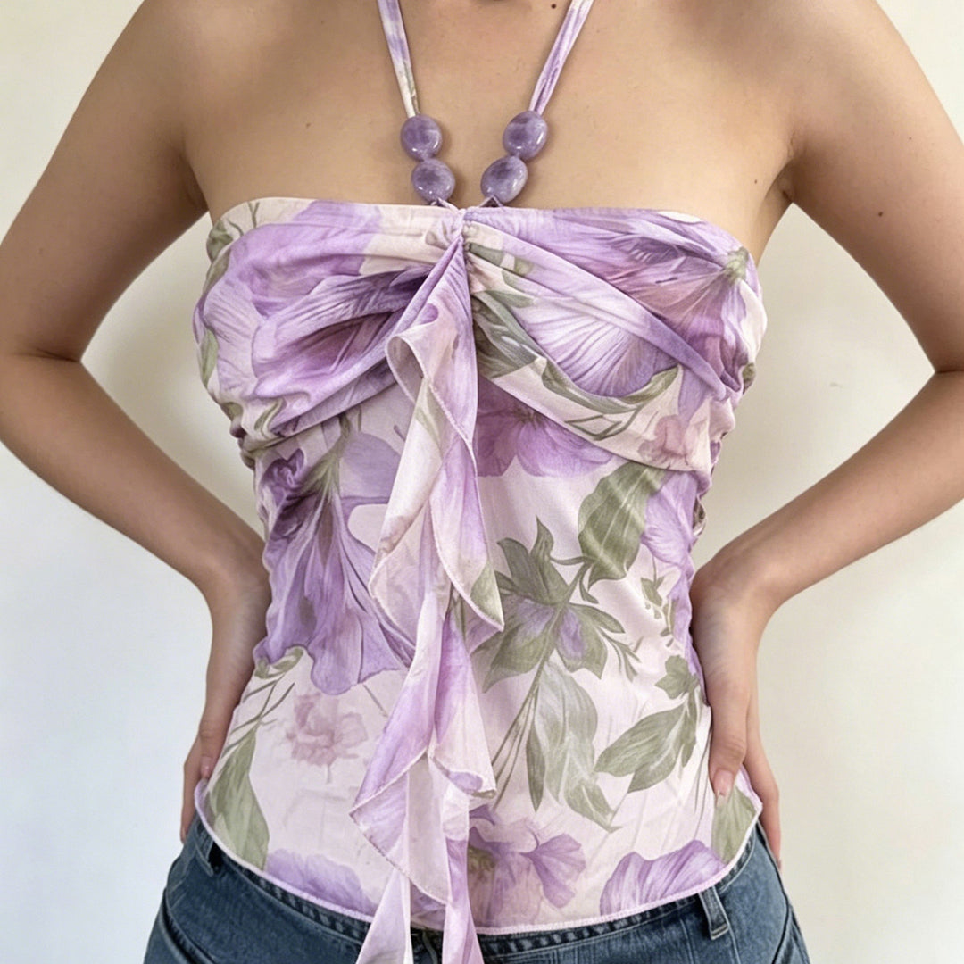 Damsk Halterneck-blus med blommigt mönster och raffinerad lockavslutning Mirla-Eva Jonsson