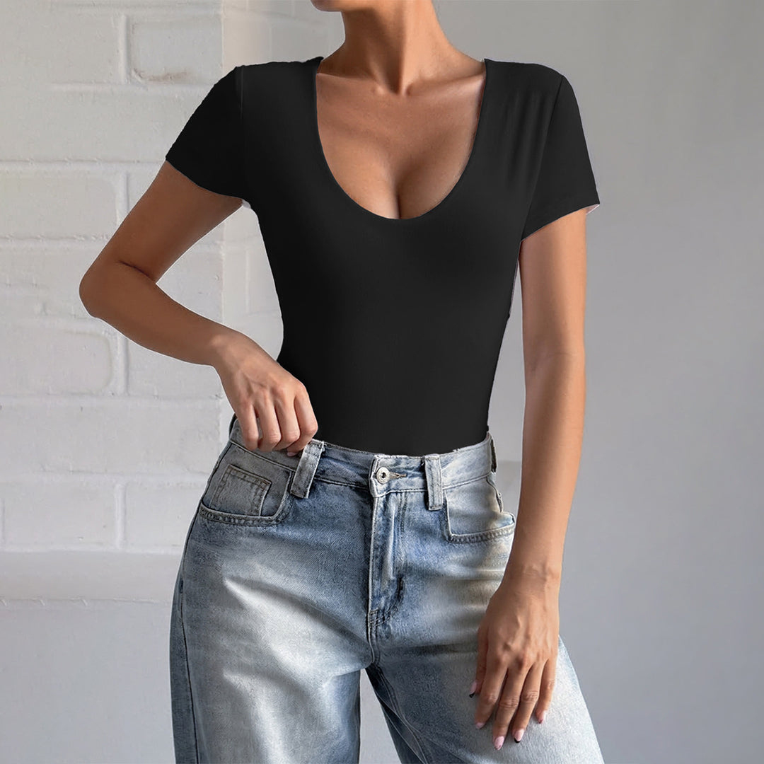 Damsk bodysuit med djup utskärning och sidoförskärningar Mirla-Eva Jonsson