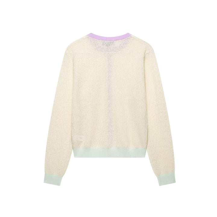 Damsk cardigan med delikat mönster och färgade detaljer Mirla-Eva Jonsson