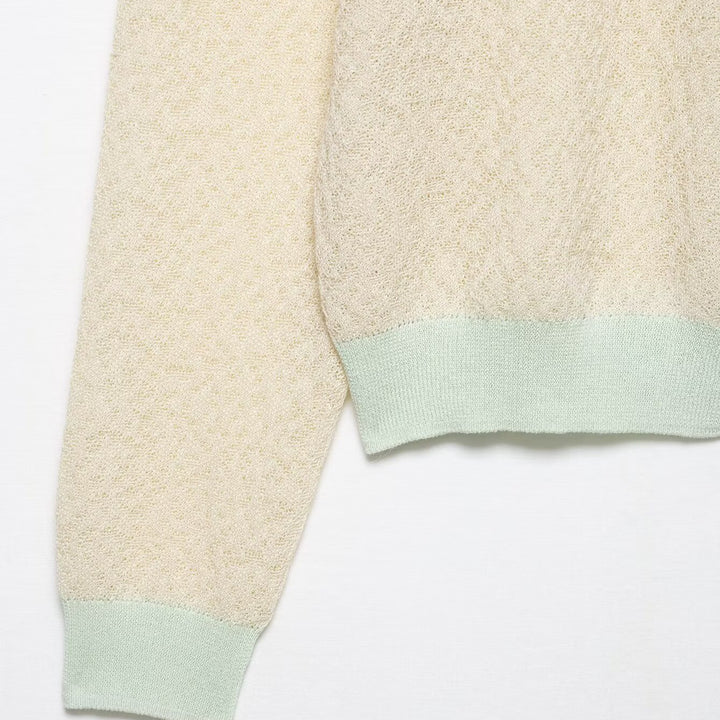 Damsk cardigan med delikat mönster och färgade detaljer Mirla-Eva Jonsson