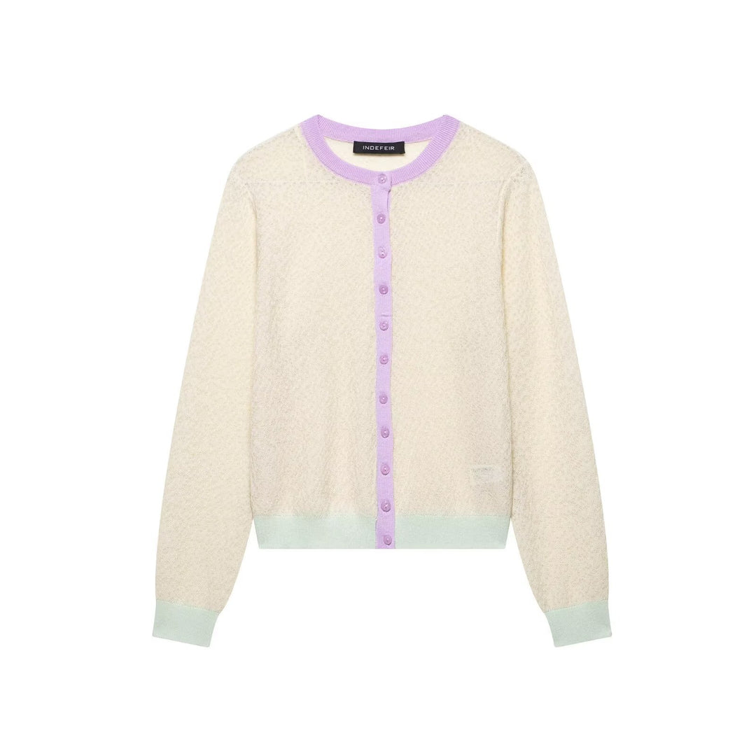 Damsk cardigan med delikat mönster och färgade detaljer Mirla-Eva Jonsson