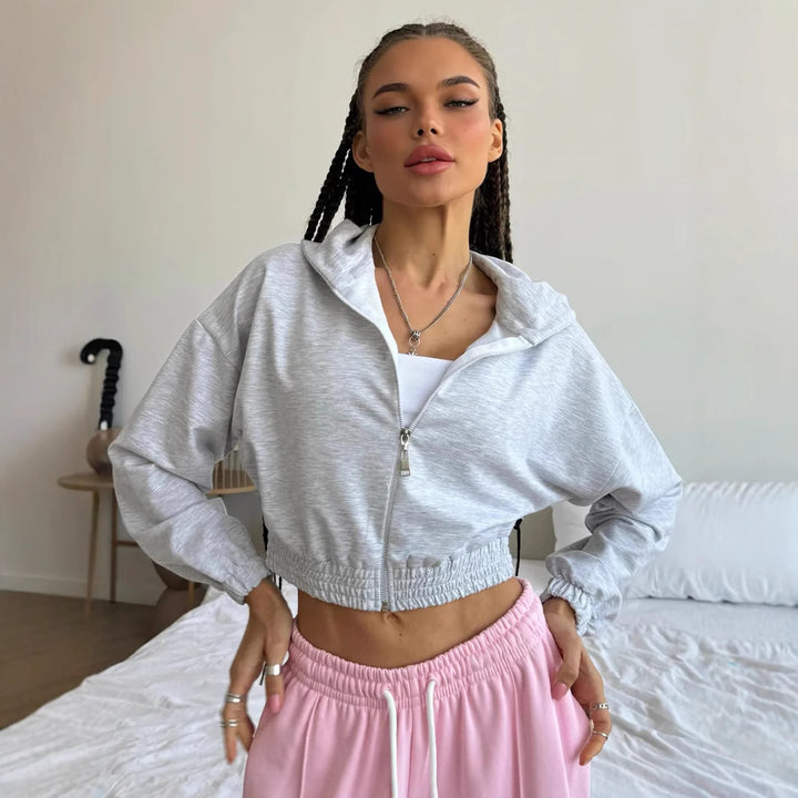 Damsk cropped hoodie jacka med elastisk midja och avslappnad passform Mirla-Eva Jonsson