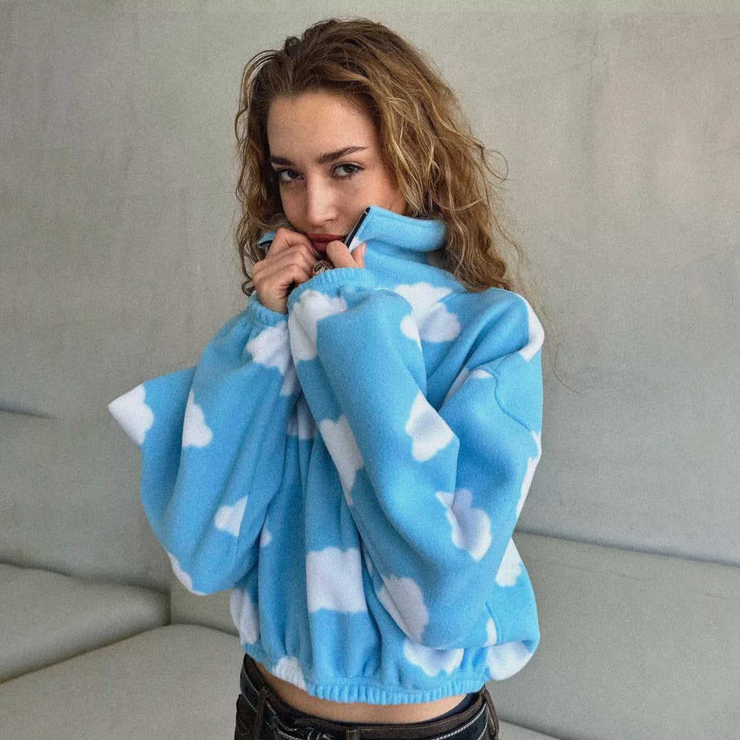 Damsk mysig fleece-tröja med molnmönster Mirla-Eva Jonsson