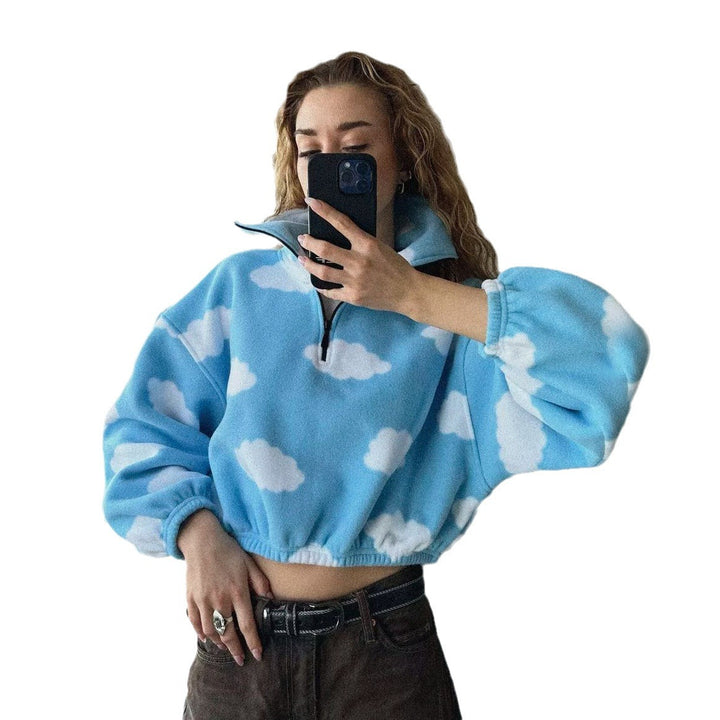 Damsk mysig fleece-tröja med molnmönster Mirla-Eva Jonsson