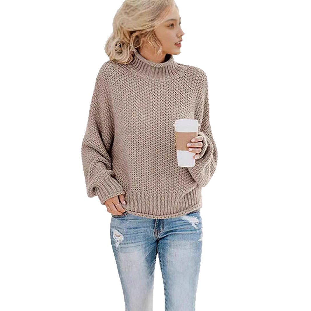 Damsk mysig tröja med hög krage och vida ärmar Mirla-Eva Jonsson