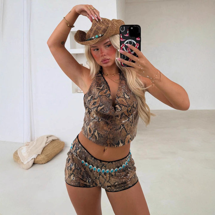 Damsk set med skimrande topp och korta shorts i djurmönster Mirla-Eva Jonsson