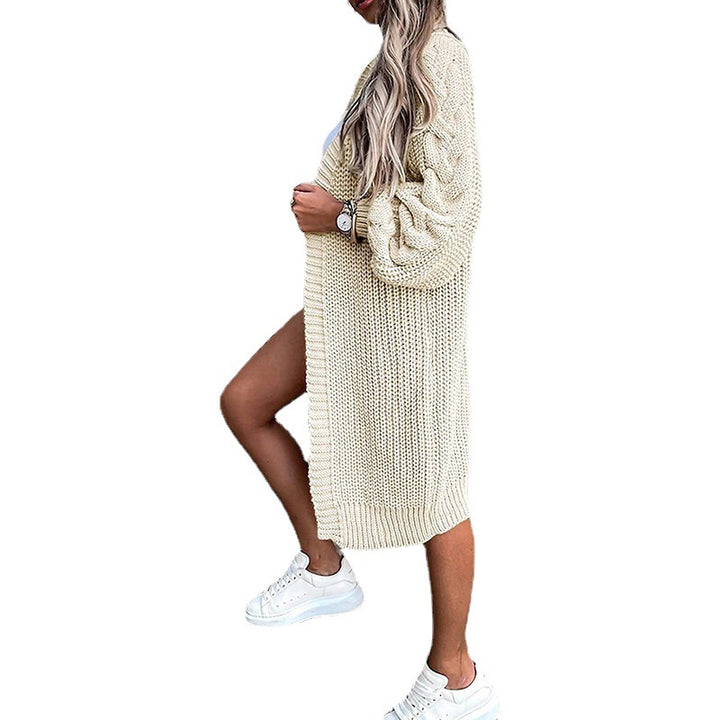 Damsk stickad jacka med voluminösa ärmar och högkvalitativt flätadesign Eva Jonsson-Eva Jonsson