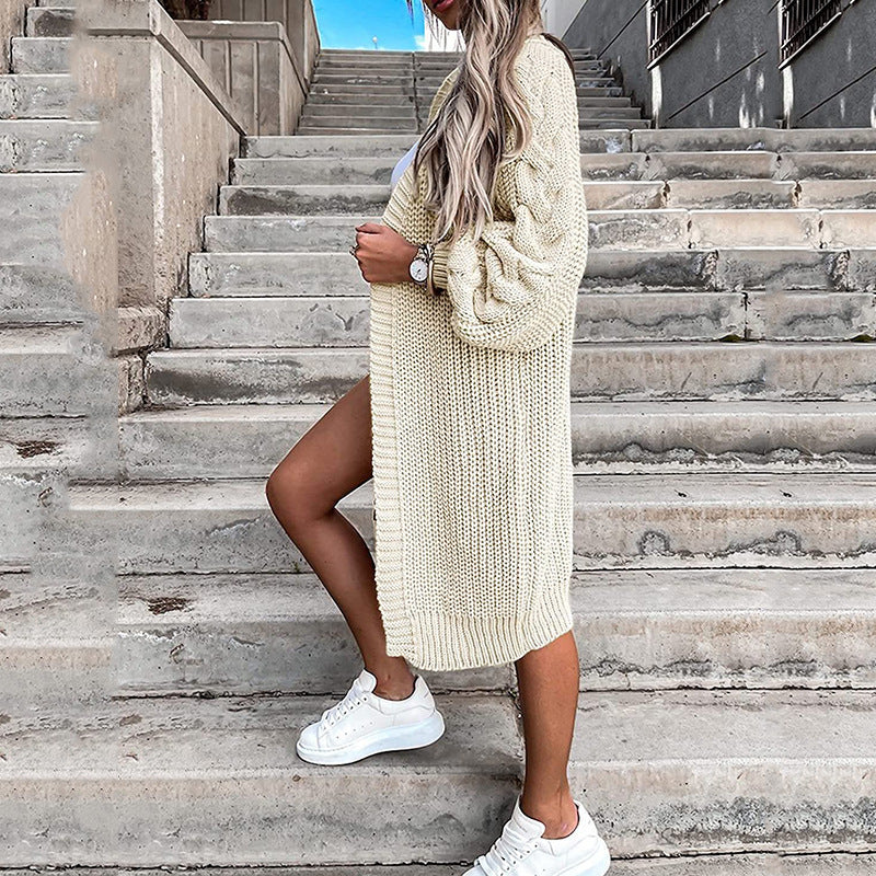 Damsk stickad jacka med voluminösa ärmar och högkvalitativt flätadesign Eva Jonsson-Eva Jonsson