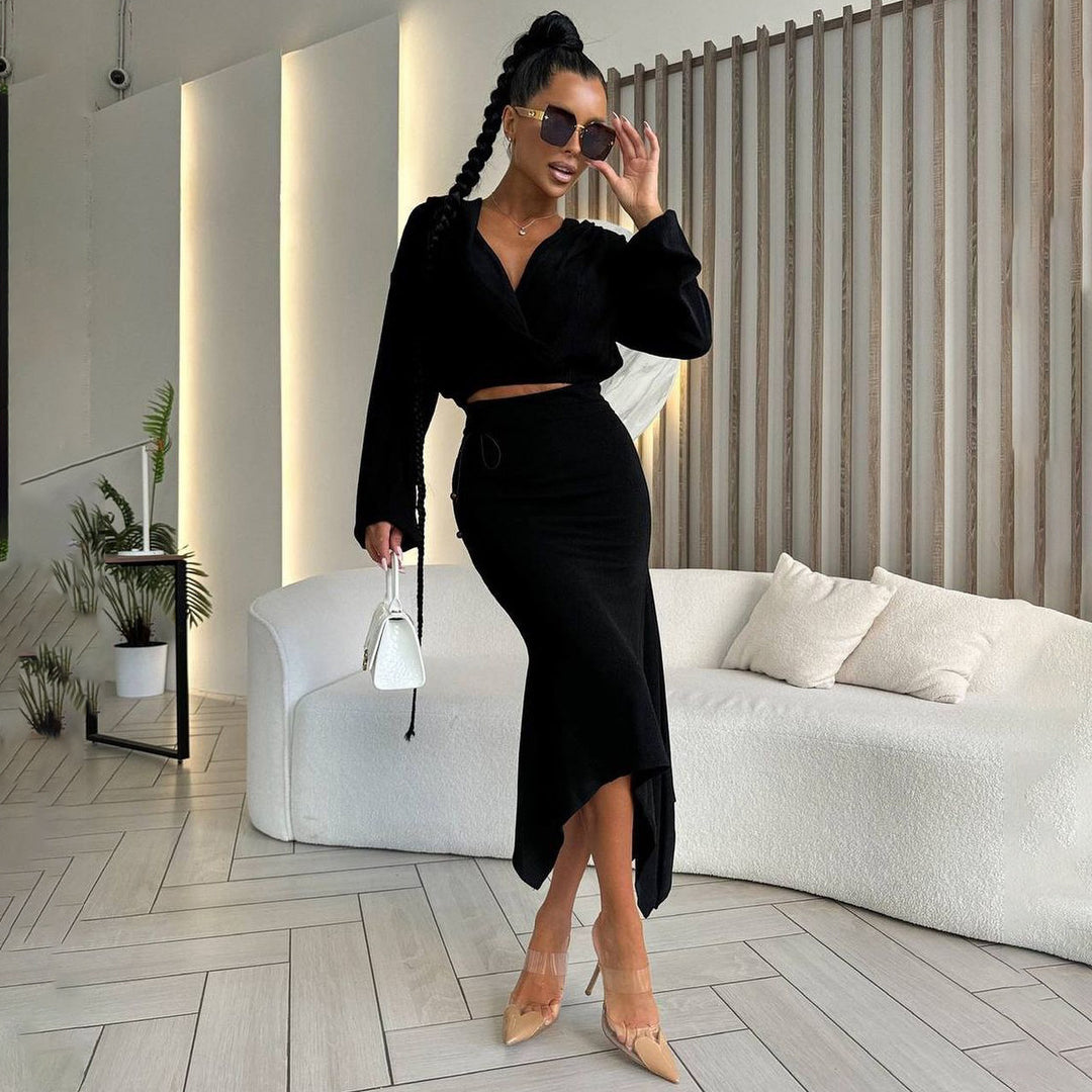 Damsk wrapklänning med asymmetrisk fåll och eleganta detaljer Mirla-Eva Jonsson