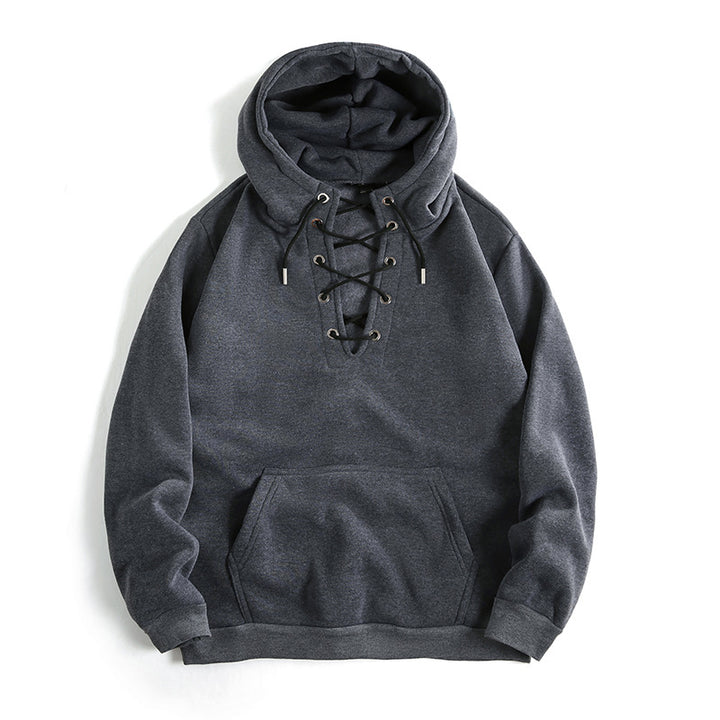 Damsk zip hoodie med raffinerad snördesign och praktisk känguruficka Mirla-Eva Jonsson