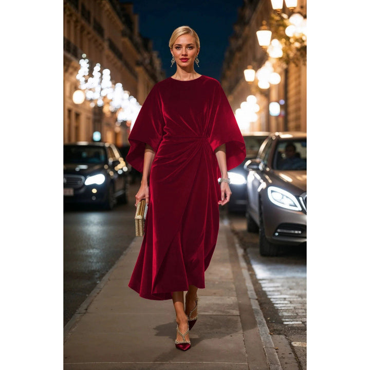 Damska aftonklänning i elegant samtdesign med voluminösa ärmar och figursydd silhuett Mirla-Eva Jonsson