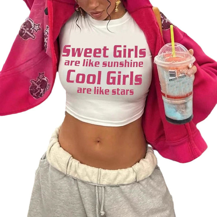Damska crop-top med motiverande text och figurnära snitt Mirla-Eva Jonsson
