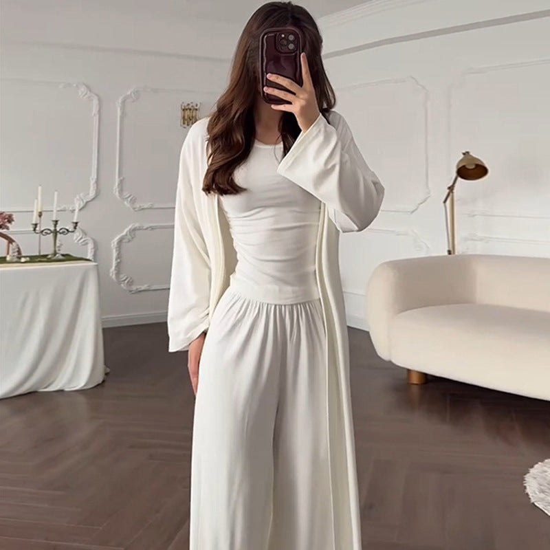 Damska loungewear-kombinering av långärmad topp och vida palazzo-byxor Mirla-Eva Jonsson