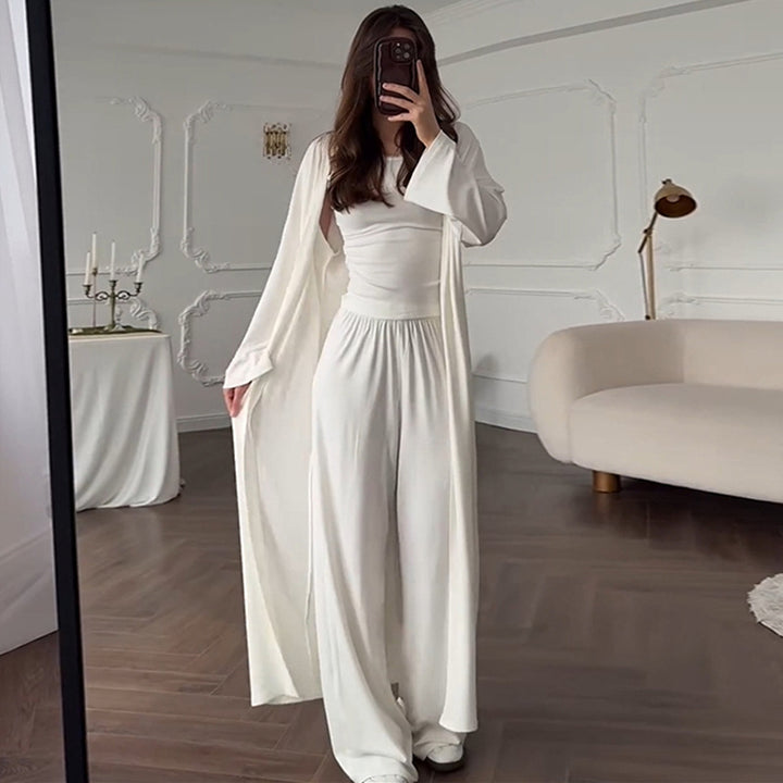Damska loungewear-kombinering av långärmad topp och vida palazzo-byxor Mirla-Eva Jonsson