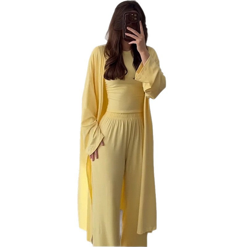 Damska loungewear-kombinering av långärmad topp och vida palazzo-byxor Mirla-Eva Jonsson