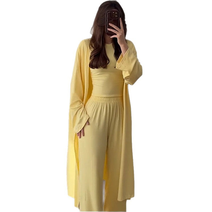 Damska loungewear-kombinering av långärmad topp och vida palazzo-byxor Mirla-Eva Jonsson