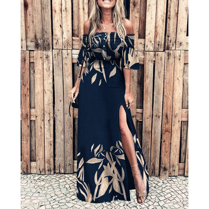 Damska maxikjol med off-shoulder design och eleganta blommönsterdetaljer Mirla-Eva Jonsson